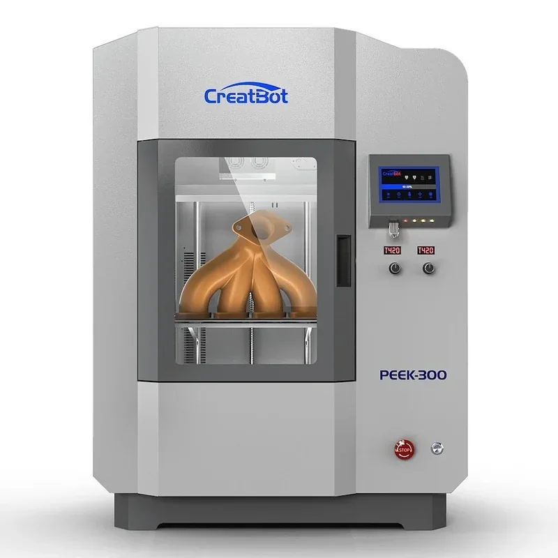 CreatBot PEEK-300 3D printer with touch screen interface, printing a complex, golden mechanical part in an industrial setting.