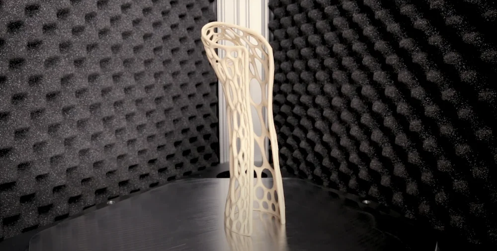 Delta WASP 2040 Industrial X 3D prints intricate, lattice structure in soundproof enclosure.