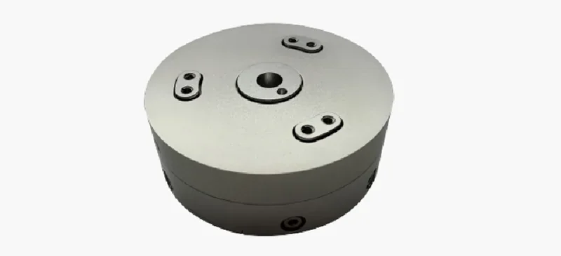 Round metal component by fairino fr3, featuring multiple mounting holes. The component is shown on a plain background, highlighting its design.