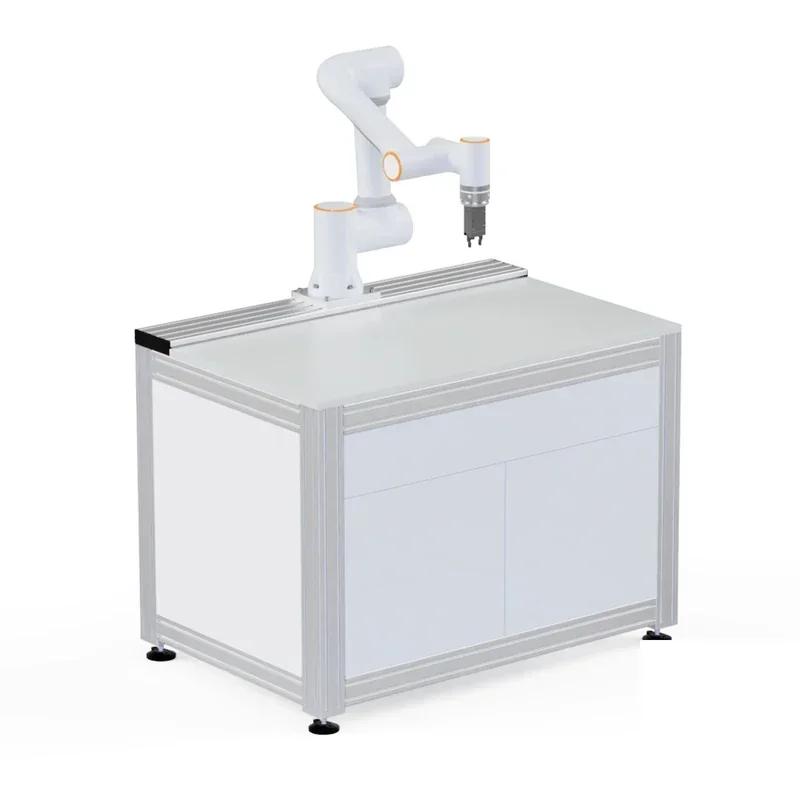 Fairino FR5 collaborative robot mounted on a metal table, positioned for part assembly or manipulation tasks in an industrial setting.