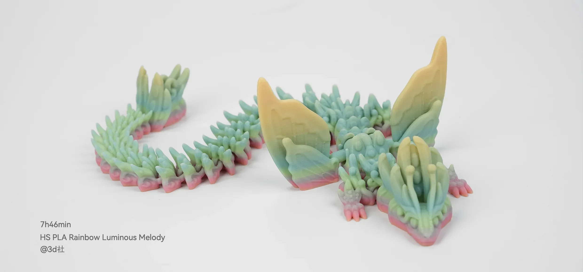 Multicolored dragon model created by Flashforge Adventurer 5M, showcasing detailed spikes and vibrant hues, demonstrating high-quality 3D printing.