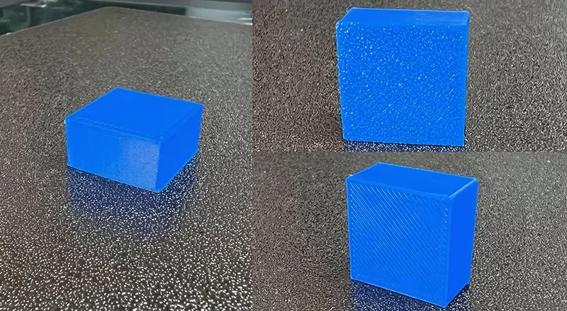 Blue cube parts 3D printed by Flashforge Adventurer 5M Pro on textured surface, showcasing detail and finish from different angles.
