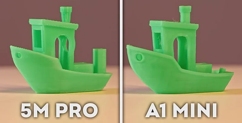 Flashforge Adventurer 5M Pro vs A1 Mini: two green 3D-printed boat models compared, highlighting detail differences.