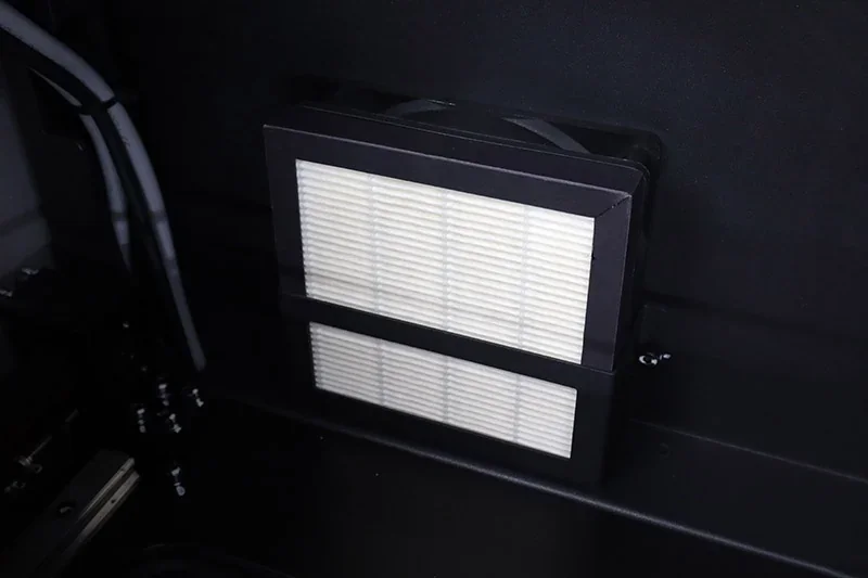 Flashforge Creator 4 internal filter, black frame, white pleated filter, positioned inside the printer with wires and fittings visible.