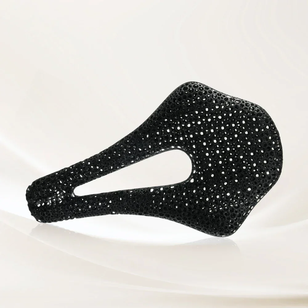 Intricate black 3D-printed object with lattice structure, possibly a saddle, created by Flashforge Creator 4, on a light background.