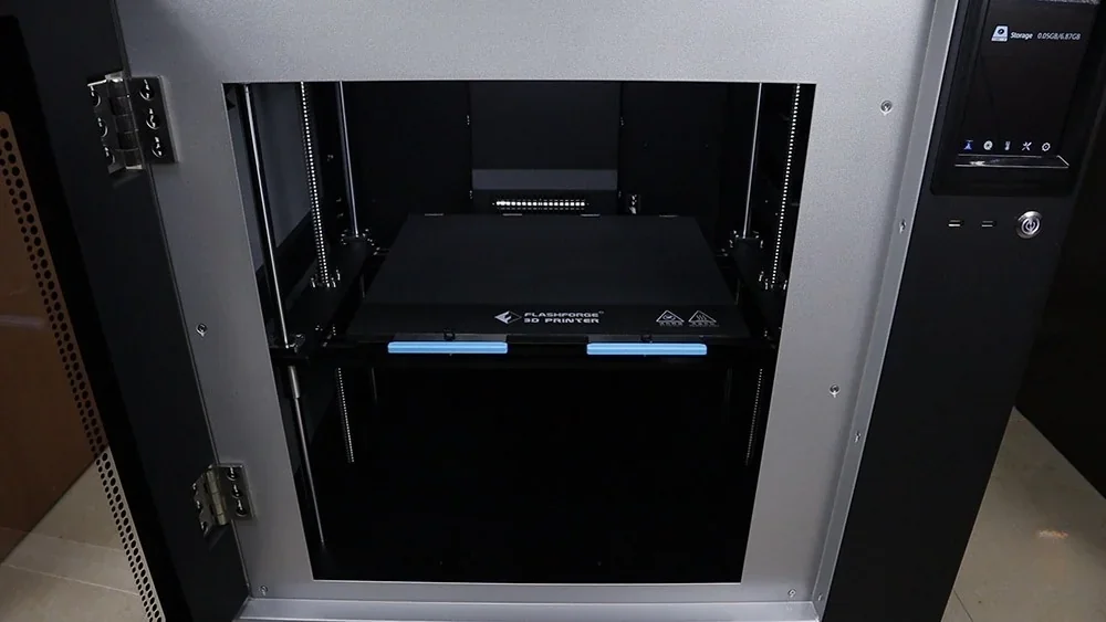 Flashforge Creator 4 3D printer featuring an open build chamber, branded build plate, and control panel visible on the side, ready for 3D printing.