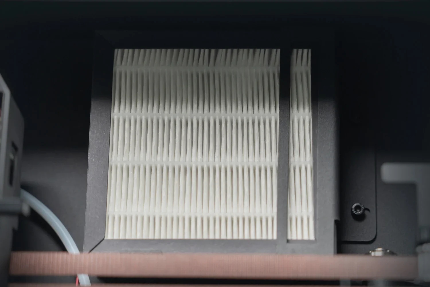 Flashforge Guider 3 Ultra filter element close-up, showcasing intricate pleated design and internal components, indicating advanced air filtration system.
