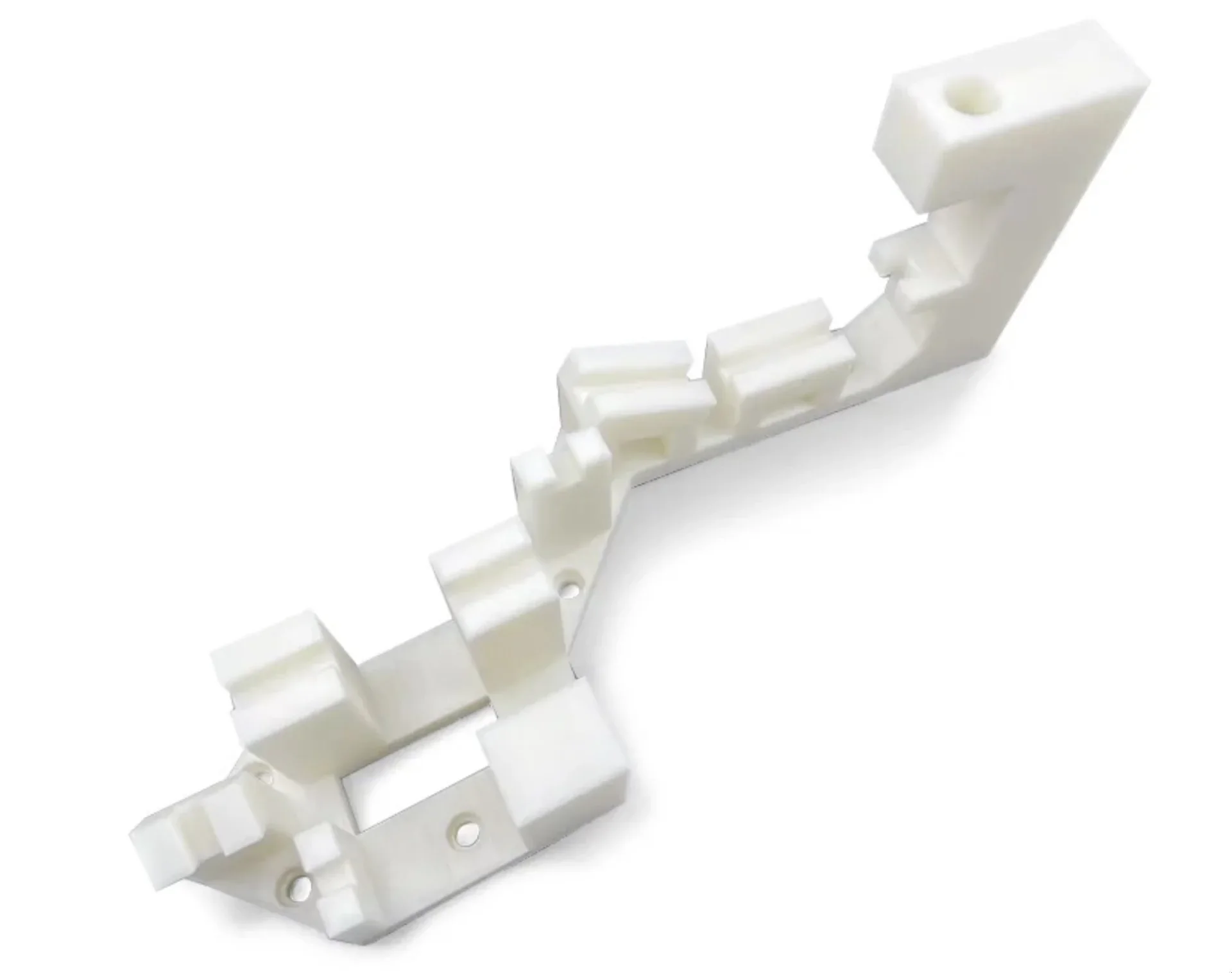 White 3D-printed component with geometric cutouts, produced by Flashforge Guider 3 Ultra, showcasing precision and intricate design details.