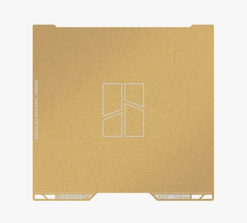 Bambu textured PEI plate for h2c bambu 3D printer, gold-colored with logo, textured finish for optimal printing quality and adhesion.