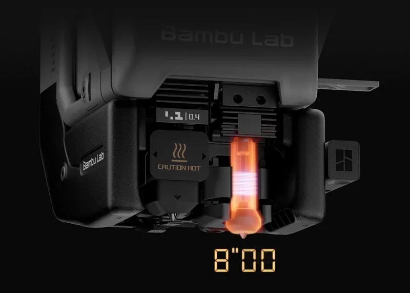 H2C Bambu component with glowing filament, caution hot sign, digital display; vivid colors and branding elements visible.