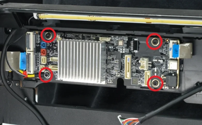 3D printer circuit board for h2c Bambu, with four screws circled in red and central heat sink; internal view showing wiring and connectors.