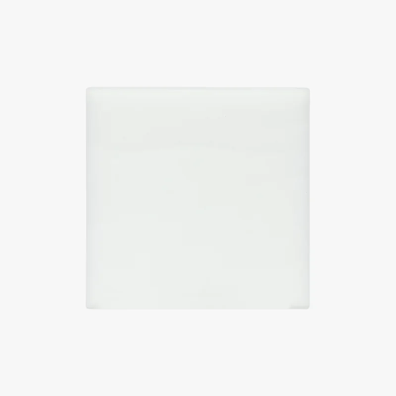 White square object, glossy surface representing H2C Bambu 3D printer component against plain white background.
