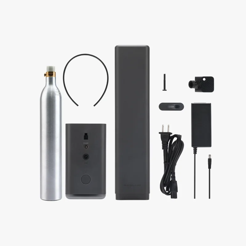 H2c Bambu accessories layout with cylinder, power adapter, cables, and mounting parts on a white background.