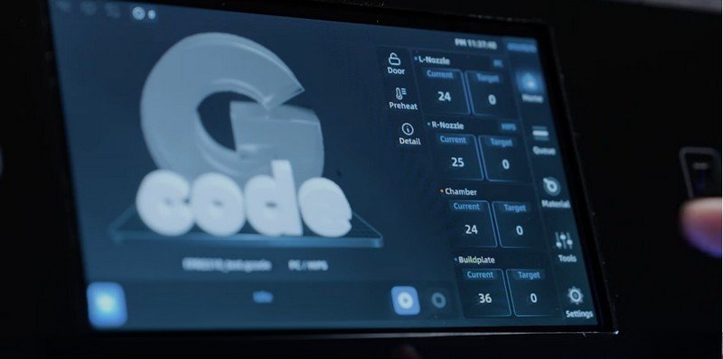 Close-up of the touchscreen interface of the Intamsys Funmat Pro 310, showcasing a detailed 3D printing interface. The screen displays a G-code 3D model with various on-screen controls for adjusting settings such as nozzle temperature, chamber conditions, and build plate heat. Each of these components is marked with current and target metrics for precision. The layout is intuitive, supporting advanced monitoring and operation of the 3D printer.
