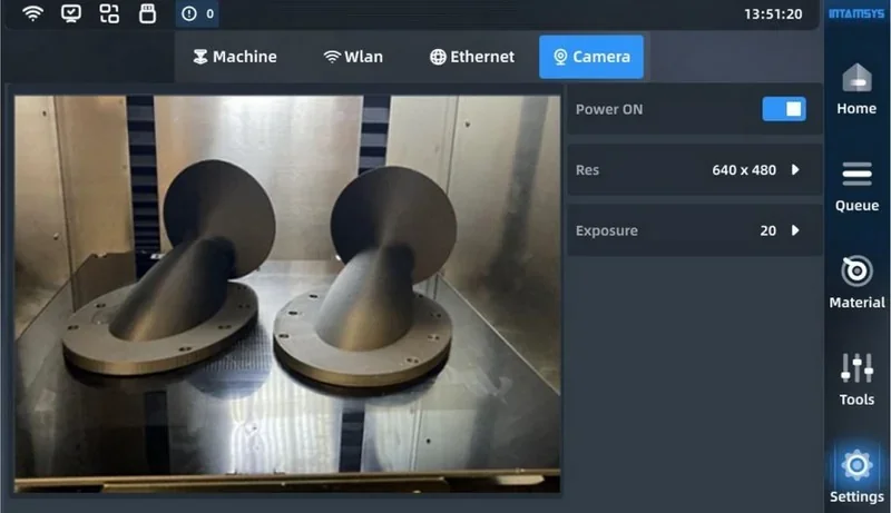Intamsys Funmat Pro 310 interface showing two 3D-printed parts in progress inside the printer chamber, surrounded by menu options and settings.