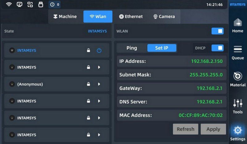 A screenshot of the INTAMSYS FUNMAT PRO 310’s user interface, depicting the WLAN configuration settings. The interface is organized with labeled tabs for Machine, WLAN, Ethernet, and Camera. The selected WLAN tab displays network connection options and technical specifics like IP address, Subnet Mask, Gateway, DNS Server, and MAC Address. This digital interface is marked with the INTAMSYS branding in the corner, enhancing brand recognition.