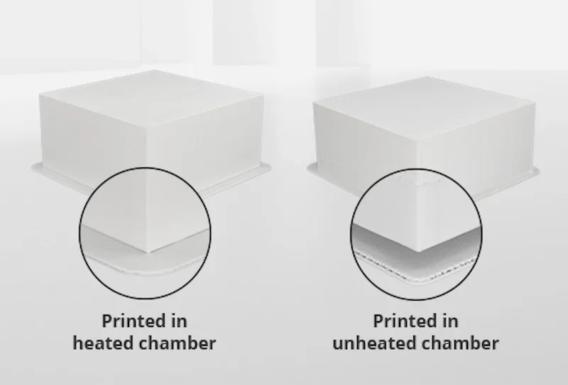 Comparison of two 3D-printed cubes by Intamsys Funmat Pro 310; left printed in heated chamber, right in unheated, showing different surface quality.