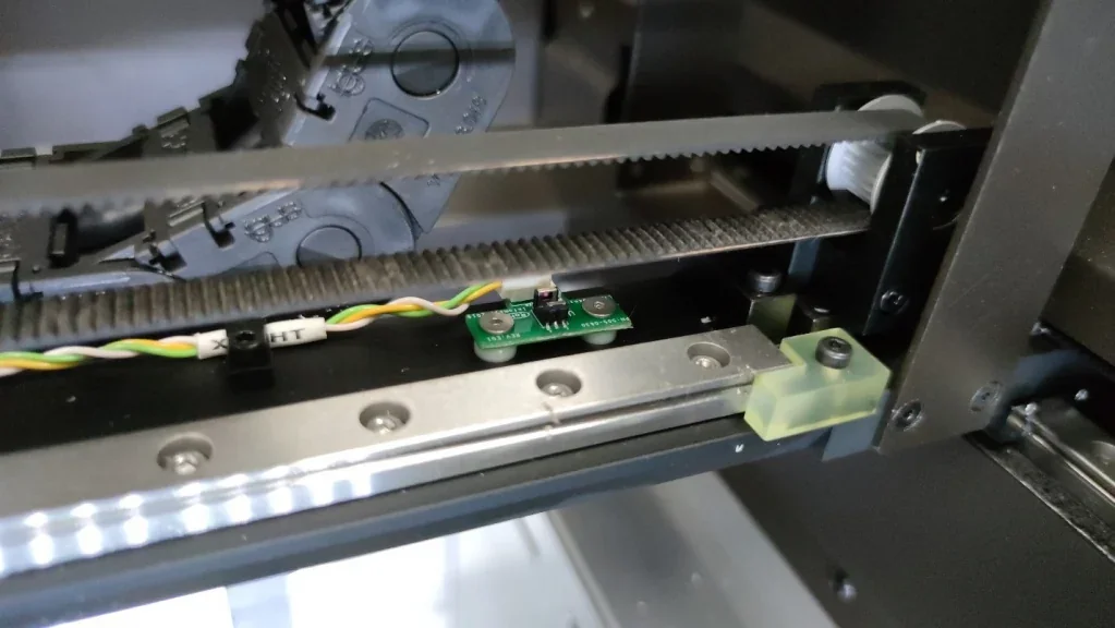 Intamsys Funmat Pro 410 internal view showing components and wiring detail, highlighting precision mechanisms for 3D printing functionality.