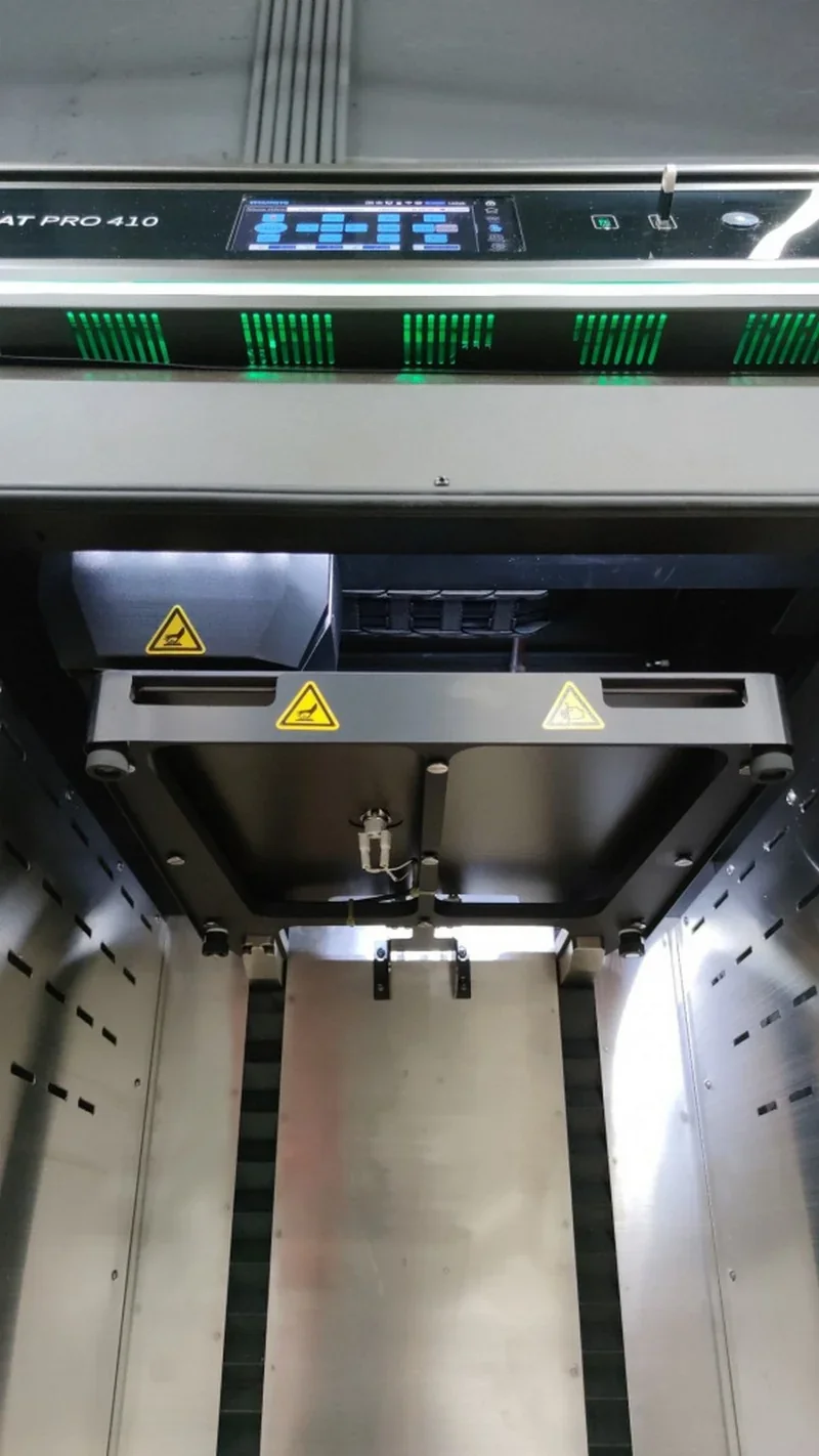 intamsys Funmat Pro 410 3D printer interior showing dual extrusion setup and control panel.