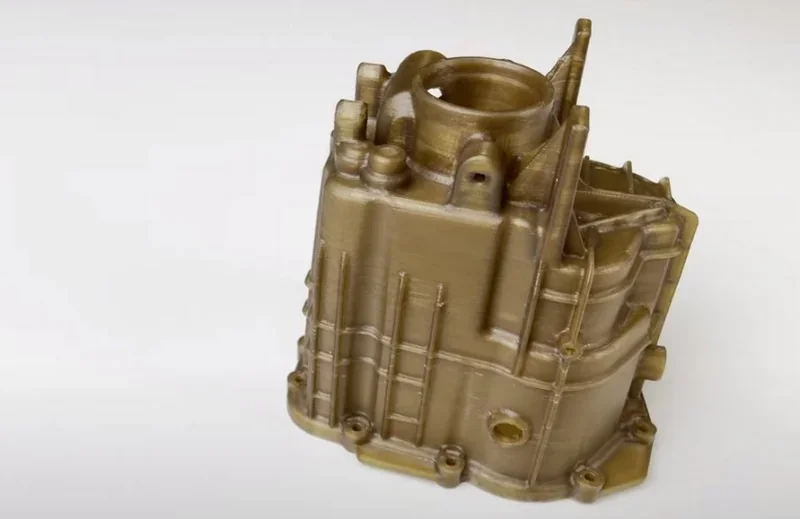 3D-printed industrial component, beige hue, intricate design, showcasing capability of Intamsys Funmat Pro 610 HT printer.