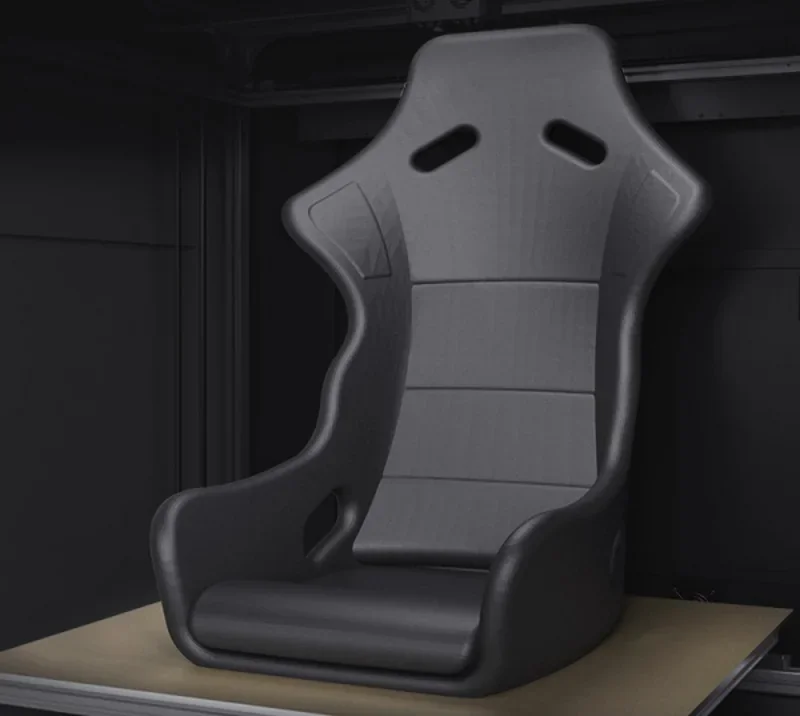 3D-printed racing seat created by mingda md-1000d, set in an industrial environment, showcasing the printer's large-scale production capability.