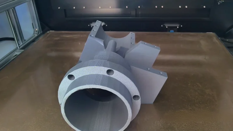 Mingda MD-1000D 3D printer creates a large, intricate gray component in a spacious printing chamber, featuring precision details and robust structure.