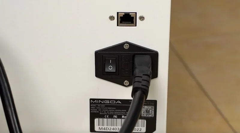 Mingda MD-400D 3D printer power and Ethernet ports on a white panel with branding label, showing the rear connection setup.