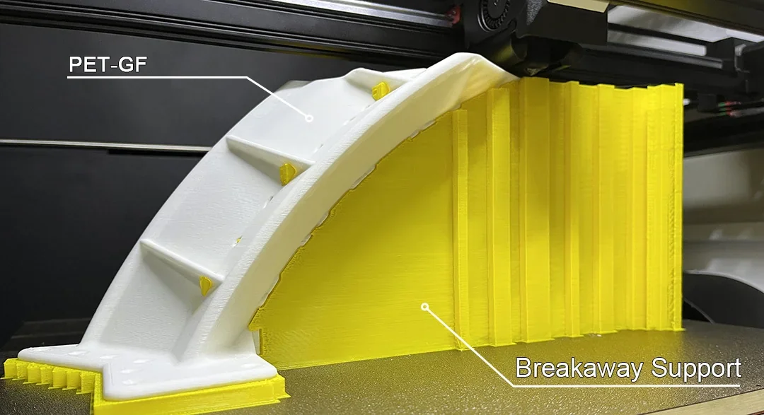 Mingda MD-600D 3D printer creates a white PET-GF part with yellow breakaway supports, showcasing advanced printing capability.