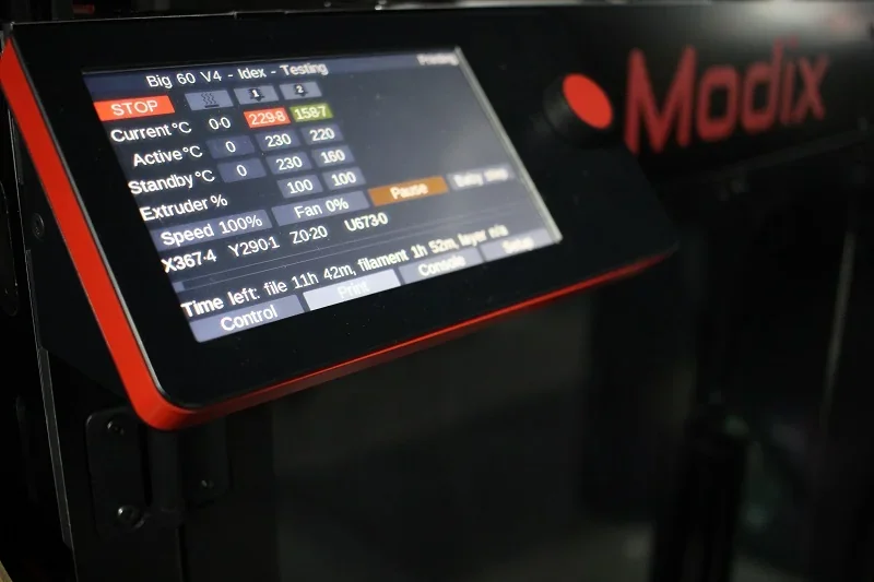 Modix Big 120x control screen displaying temperature, speed, and status; brand logo visible.