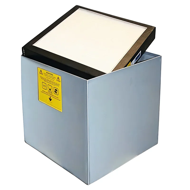 A Modix Big 60 HEPA filter box with a yellow warning label, featuring a partially open lid demonstrating air filtering capabilities.