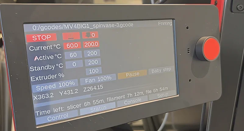 Modix Everest 3D printer control panel displays temperature, extruder speed, and print file details, showcasing current project status.