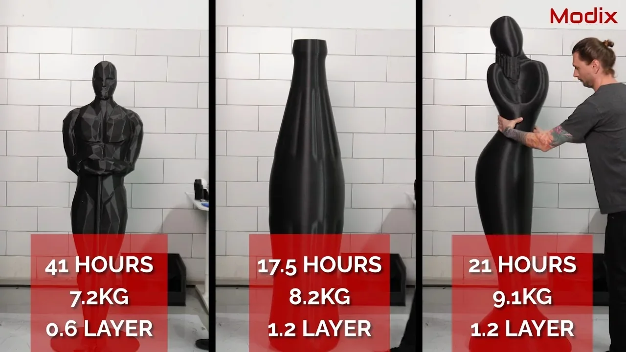 Modix Everest printed large black sculptures in various shapes with completion times and weights displayed below each, background shows tile wall.