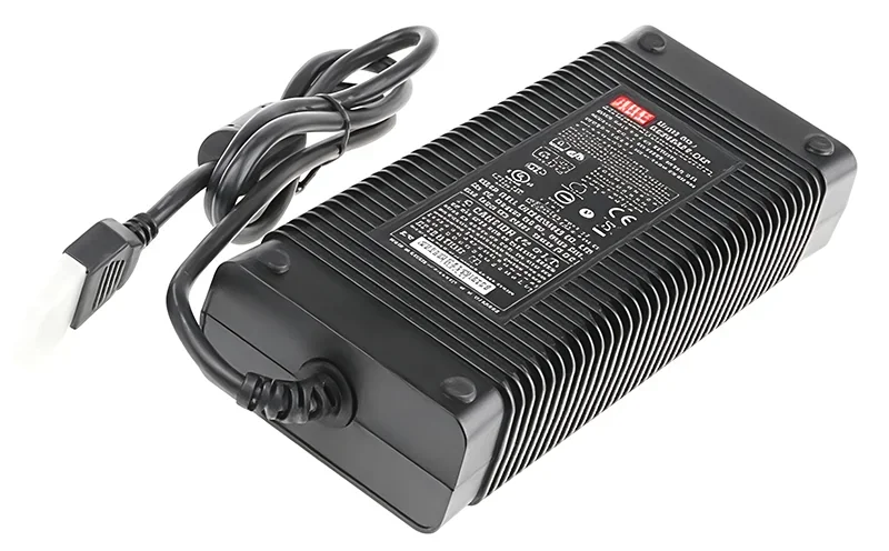 Modix Everest power supply unit with a ridged black casing and attached cable, featuring detailed specifications label on top.