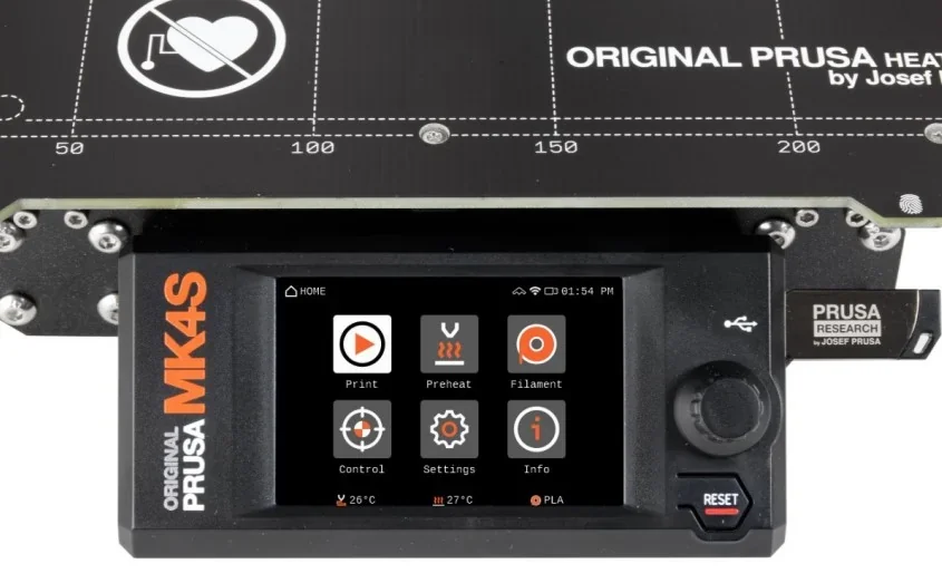 Original Prusa MK4S 3D printer kit showing control panel interface and branded heated print bed indicating precise temperature settings.