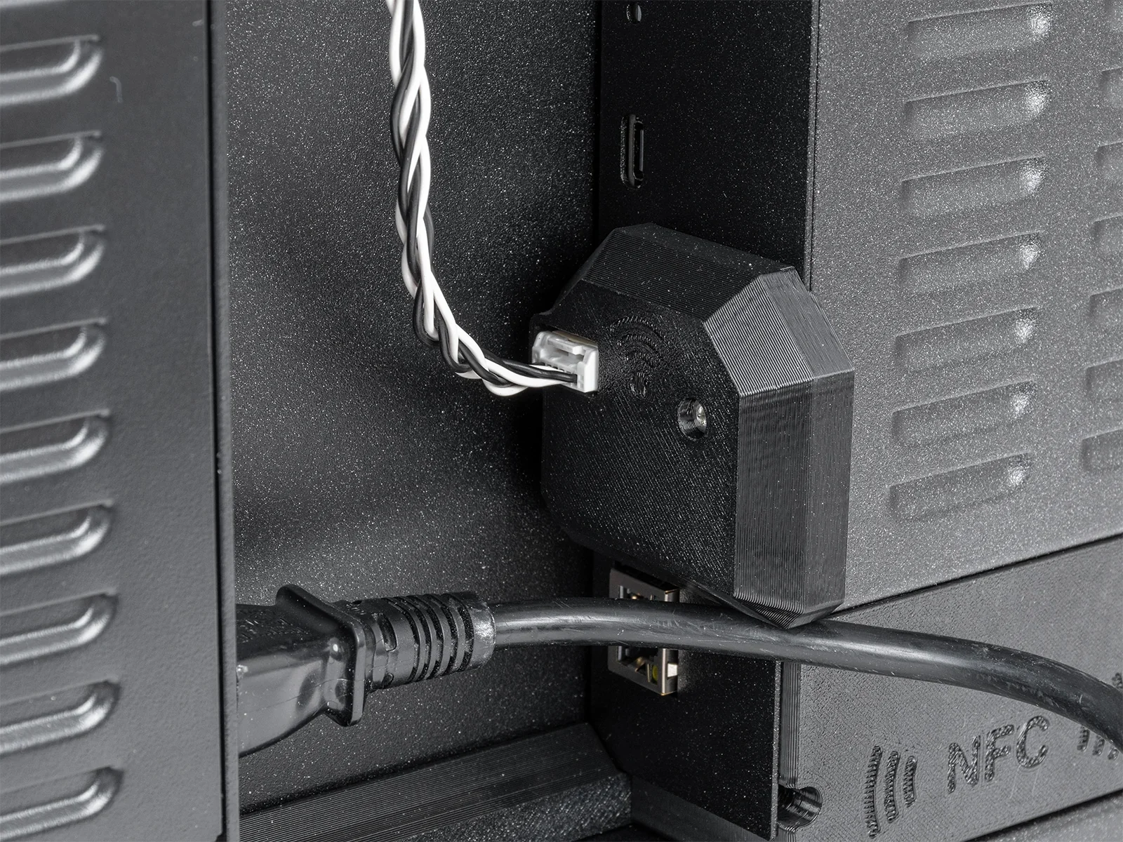 Original Prusa MK4S 3D printer kit close-up showing power cord, USB port, and twined cable connections, with NFC branding visible.