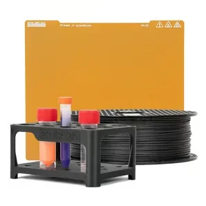 3D printer kit with filament spool, test tubes, and Prusa branding, includes Original Prusa MK4S components for professional 3D printing.