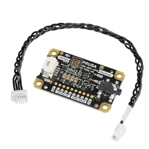 Prusa MK4S 3D printer kit component with connectors and wiring, featuring a circuit board labeled "PRUSA".