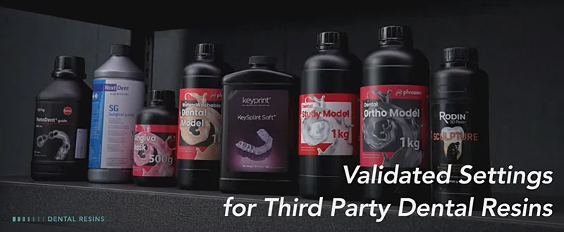 Phrozen Lumii DLP 3D printer resins displayed, including dental and ortho model options, on a shelf with branding stickers and validated settings text.