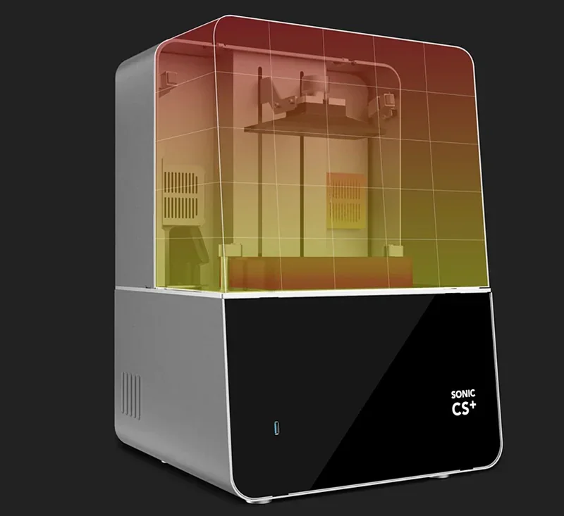Phrozen Sonic CS+ 3D printer with transparent orange cover showing interior build platform, sleek black and silver design, and visible branding.