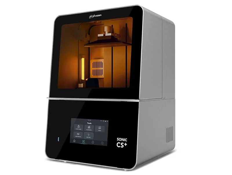 Phrozen Sonic CS+ 3D printer features a sleek design with a touchscreen display and illuminated build chamber, ideal for precise resin printing.