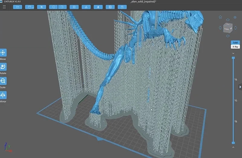 3D modeling of a detailed alien figure with supports, prepared for printing on a Phrozen Sonic Mega 8K V2, shown in a software interface.