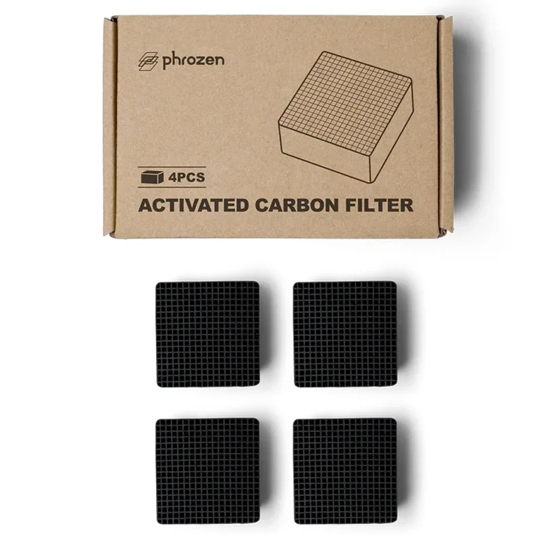 Phrozen Sonic XL 4K Plus activated carbon filters in black, with grid pattern, and branded box.