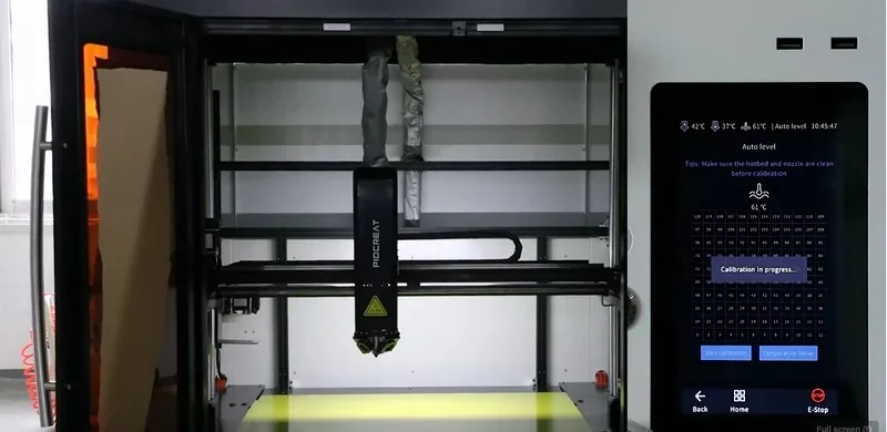 Piocreat G12 3D printer with large build area, visible touchscreen calibration display, and filament spools above; used for creating precise samples.