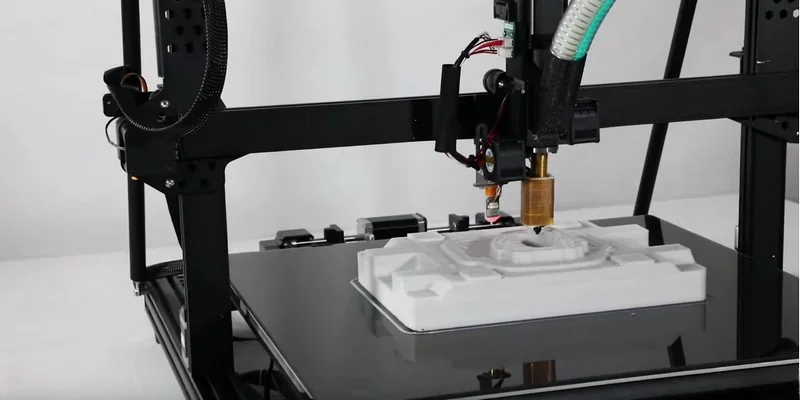 Piocreat G5 3D printer with a black frame printing a detailed white model, showcasing precision and build quality.