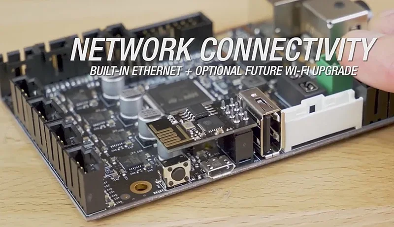Prusa Mini motherboard close-up, showcasing network connectivity features with built-in Ethernet and future Wi-Fi upgrade options.