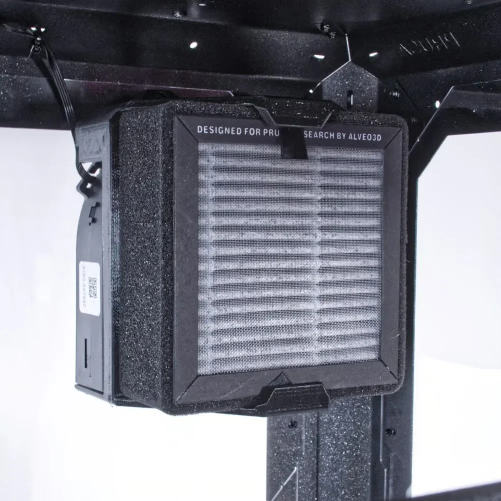 Prusa Mini 3D printer with black frame and labeled filter attachment by Alveo3D, designed for Prusa Mini.