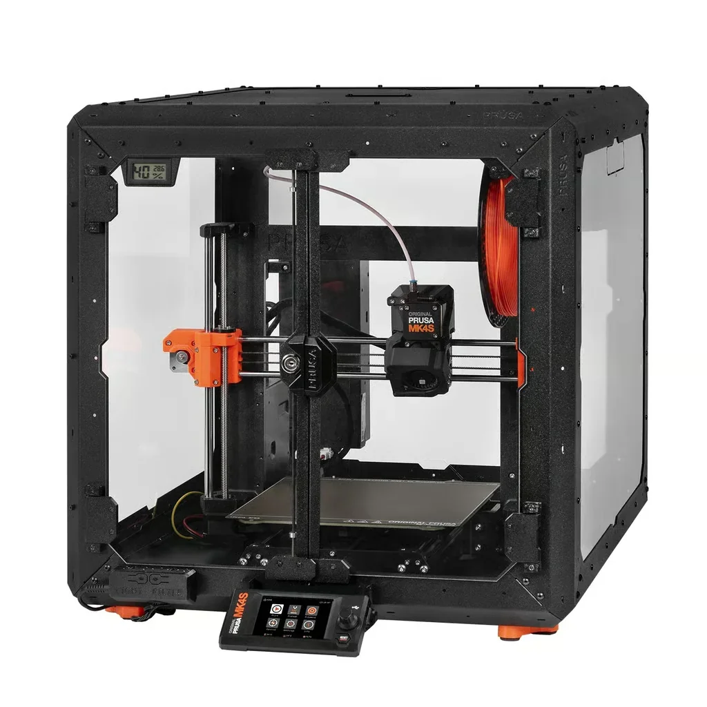 Prusa MK4 3D printer with enclosed frame, orange and black design, filament spool, display screen, and precision components visible.