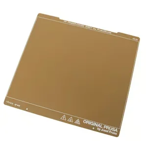 Prusa MK4 3D printer build plate displaying Original Prusa branding, brown surface designed for precise and reliable 3D printing.