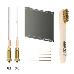 Prusa MK4 3D printer components, including nozzles, steel sheet, cleaning brush, and wires, showcasing essential parts and branding.