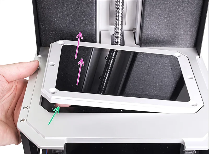 Prusa SL1S 3D printer showing the inside base and screen assembly with multi-colored arrows indicating removal or replacement directions.